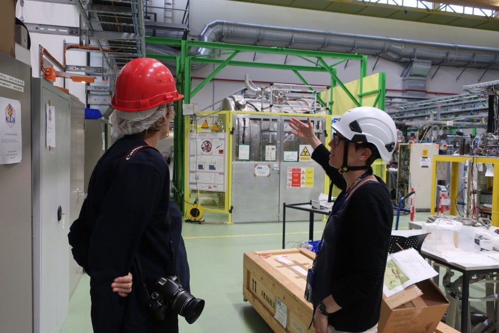 Joan Heemskerk visiting the ISOLDE facility with physicist Hanne Heylen. Photo: Xenia Harder.