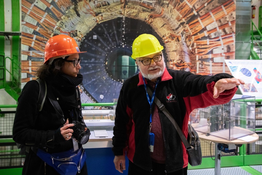Maria Paz – Exotikdot – with physicist Bolek Pietrzyk visiting the LHCb Experiment. Photo by Sophia Benett